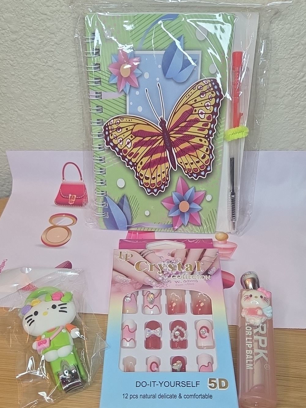 Spiral Notebook, 5D Press On Nails, HK Nail Clippers, and HK Lip Balm #001